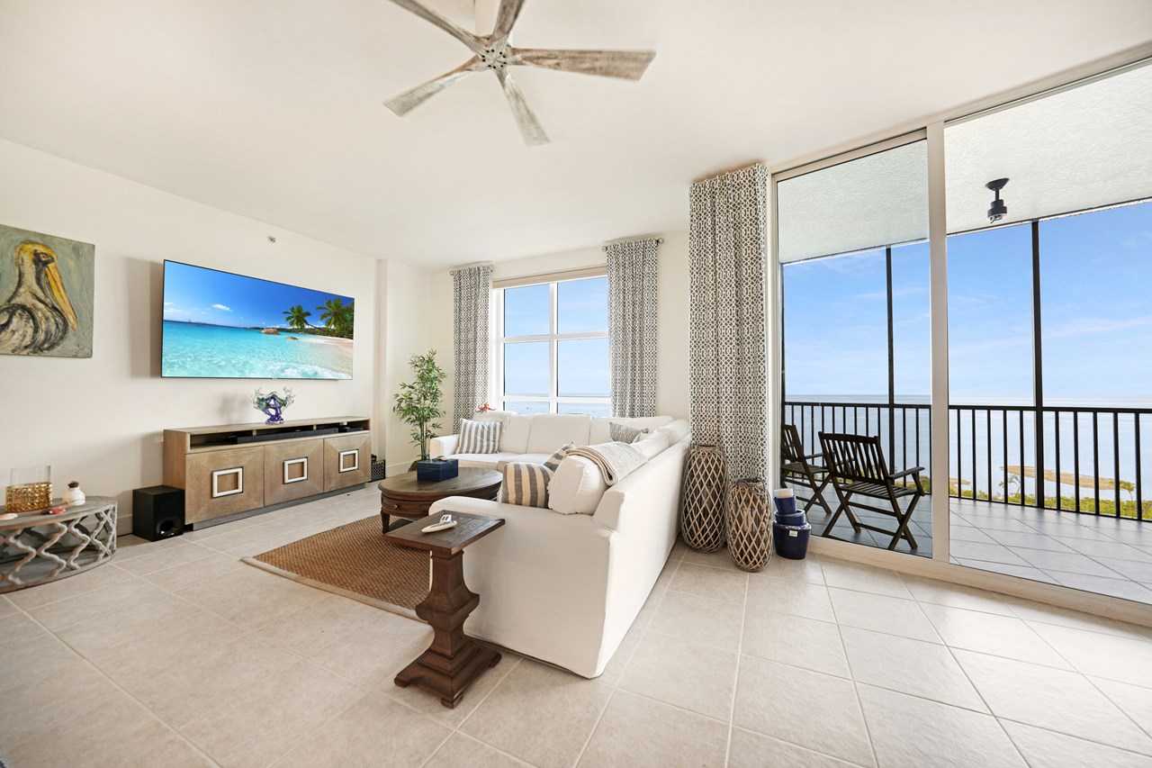 great room, includes kitchen, bar, dining and wide open living room with fabulous water views.